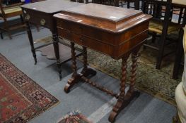 A 19th century French mahogany work table with rising top and single drawer on barley twist