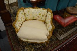 A pair of French carved gilt wood fauteuil (for restoration).