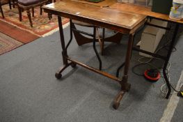 A small 19th century mahogany stretcher table.