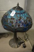A Tiffany style table lamp.