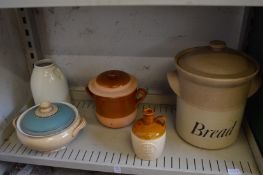 A bread crock and similar items.