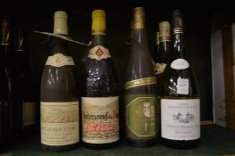Nine various bottles of white wine, various makes.