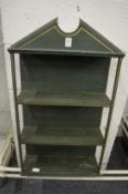 A green and gilt painted three-tier hanging shelf.