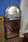 A 19th century of earlier verre eglomise arched top mirror (faults but retaining some detached