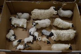 A group of porcelain and pottery sheep by Beswick and other makes.