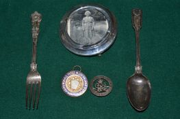 Two silver spoons, silver photograph frame and two medals.