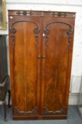 A 19th century mahogany two door wardrobe.