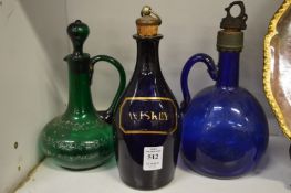 A Bristol blue small whiskey decanter and two other items.