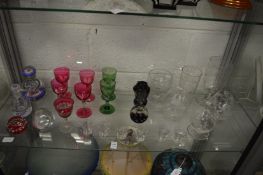 A shelf of good glassware to include millefiori inkwells.