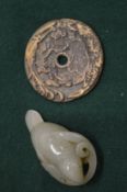 Carved jade amulet and a bronze coin style amulet.