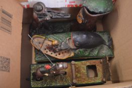 Three reproduction cast iron money boxes.