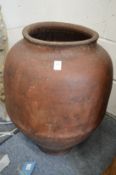 A large earthenware pot.