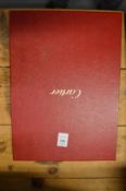 A book on Cartier with a slip case.