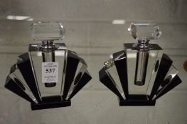 A pair of Art Deco style fan shaped glass scent bottles.