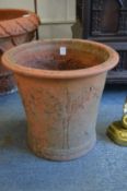 A good pair of terracotta jardinieres or planters with incised decoration.