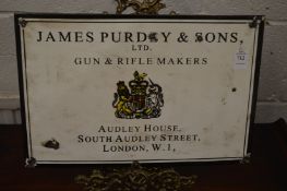 An enamel sign James Purdey & Sons.