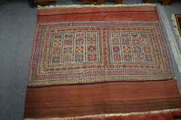 An unusual Persian rug or wall hanging with wide flat weave borders top and bottom, 150cm x 130cm.