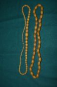 Two horn bead necklaces.