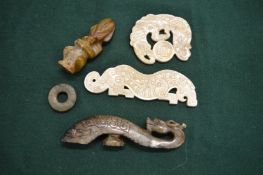A collection of Chinese carved jade and jadeite items.