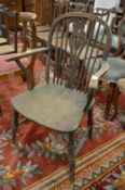 A 19th century ash and elm Windsor armchair.
