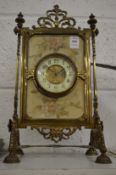 Decorative brass framed mantel clock.