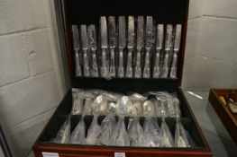 A cased six place canteen of cutlery, appears unused.