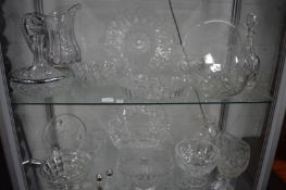 A quantity of household and decorative glassware to include jugs, vases, decanters, bowls etc.