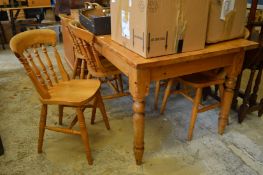 Pine kitchen table and six chairs.