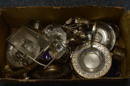 A box of plated wares.