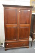 A 19th century mahogany two door wardrobe with a long drawer to the base.