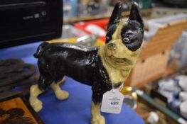 A cast iron model of a dog.