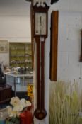 A good reproduction mahogany stick barometer by P Collins, Merton.