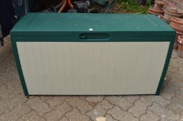 A plastic garden storage box.