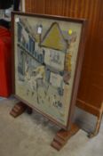 A pictorial needlework fire screen/table.
