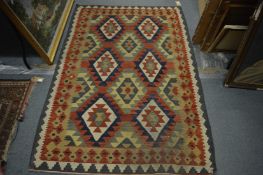 A flat weave Kilim, 182cm x 122cm.