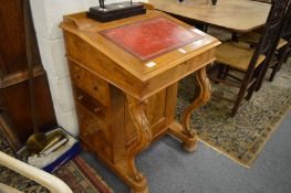A Victorian walnut Davenport.