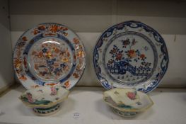 Two Japanese Imari plates and a pair of small Chinese octagonal shaped dishes.