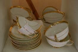 Soup bowls and stands.