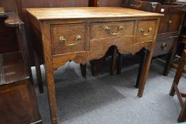 A 19th century oak low boy.