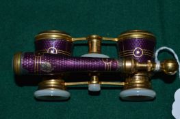 A pair of enamel opera glasses with velvet case (some enamel loss).