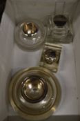 Four silver mounted glass inkwells.