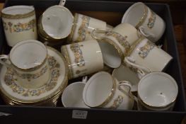 Eighteen Aynsley Henley coffee cans and saucers.