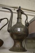 Large Islamic tinned copper ewer.