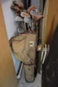 Bag of old golf clubs.