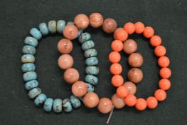 Three bead bracelets.