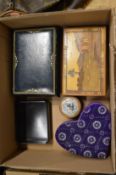Five decorative boxes.