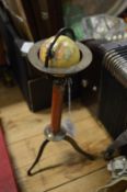 A miniature globe on stand.