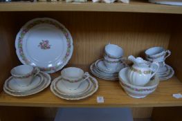 A floral decorative six place tea service.
