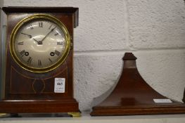 A good mahogany bracket clock complete with bracket.