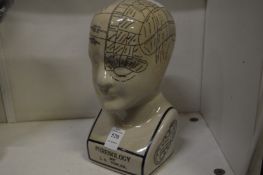 A reproduction porcelain phrenology head.